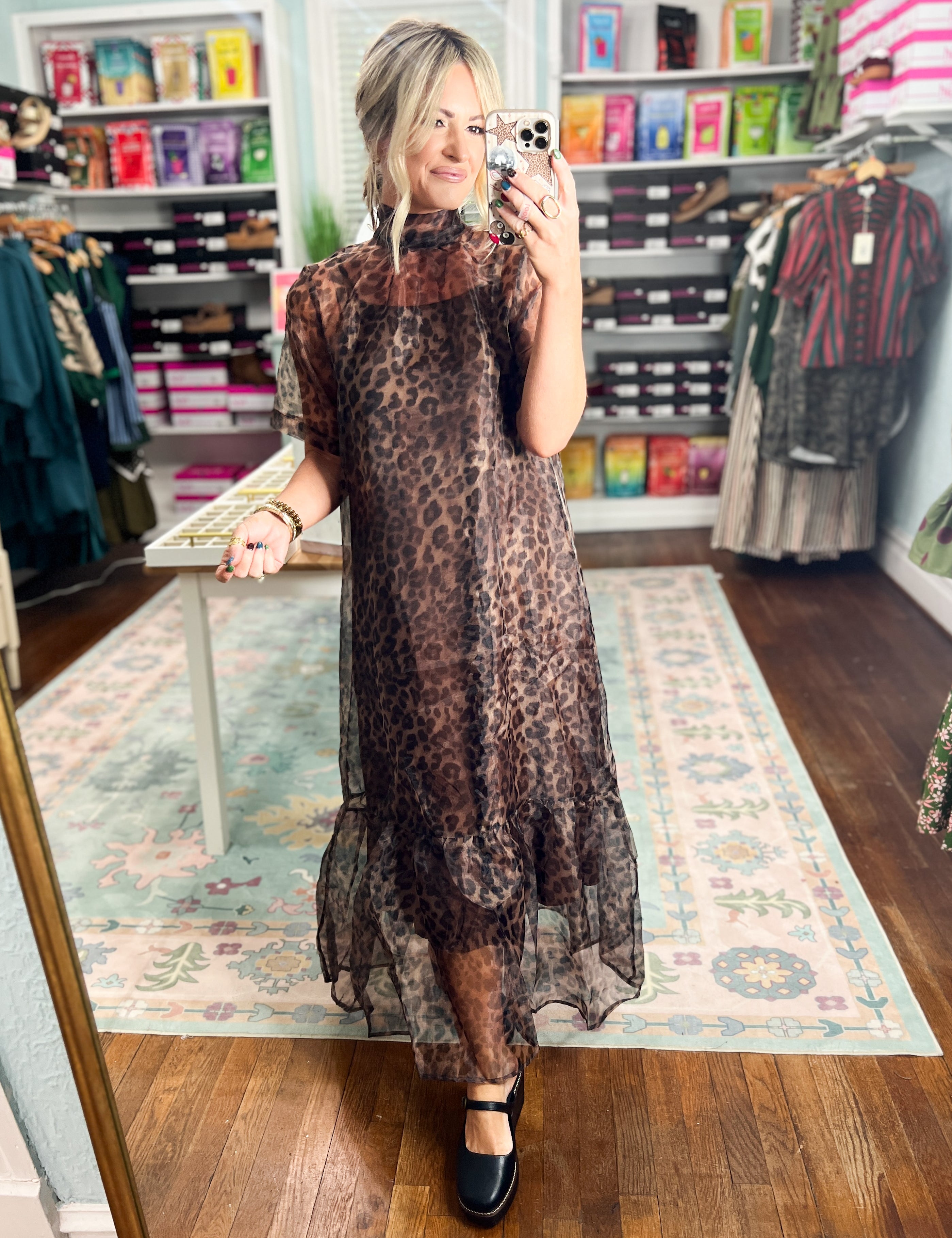 Brown leopard-print midi dress with high neckline, short sleeves, and layered tulle hem
