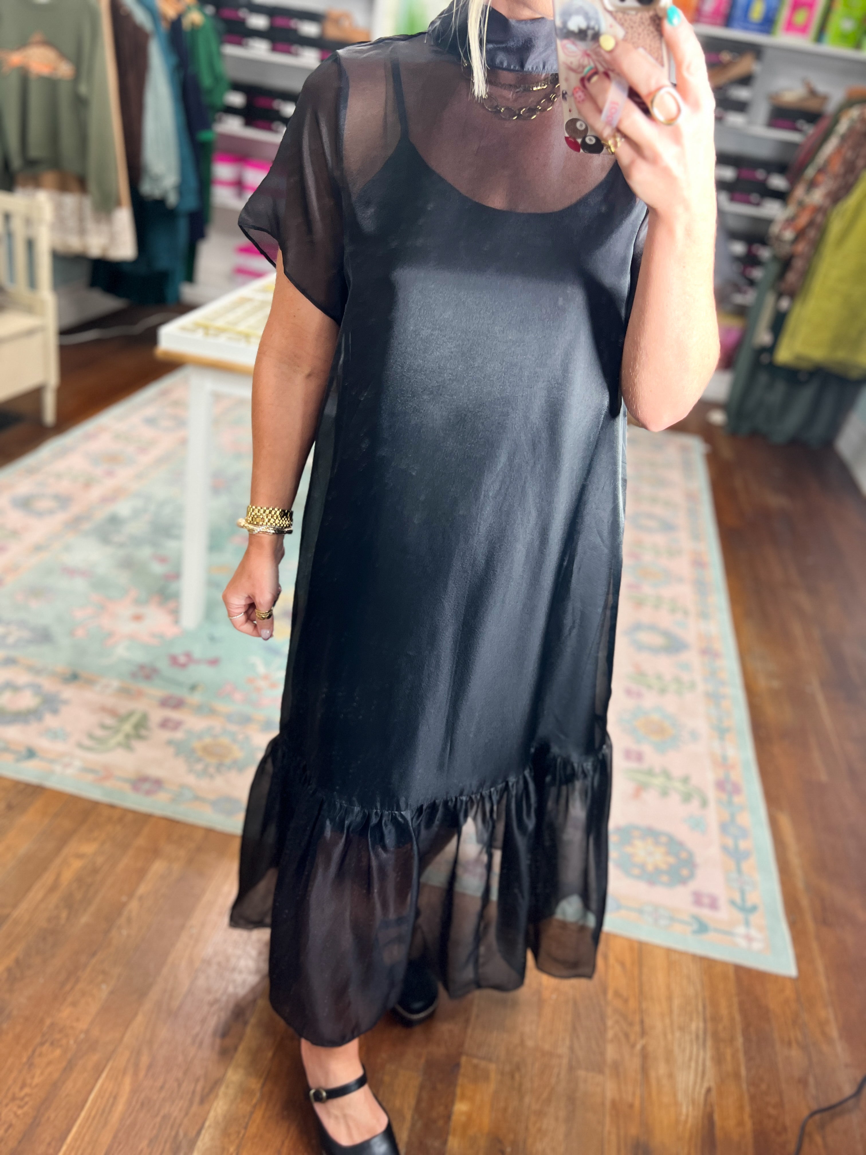 Black chiffon midi dress with short sleeves and tiered ruffle hem