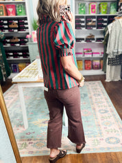 Green and rust vertical striped top with short puff sleeves, back view