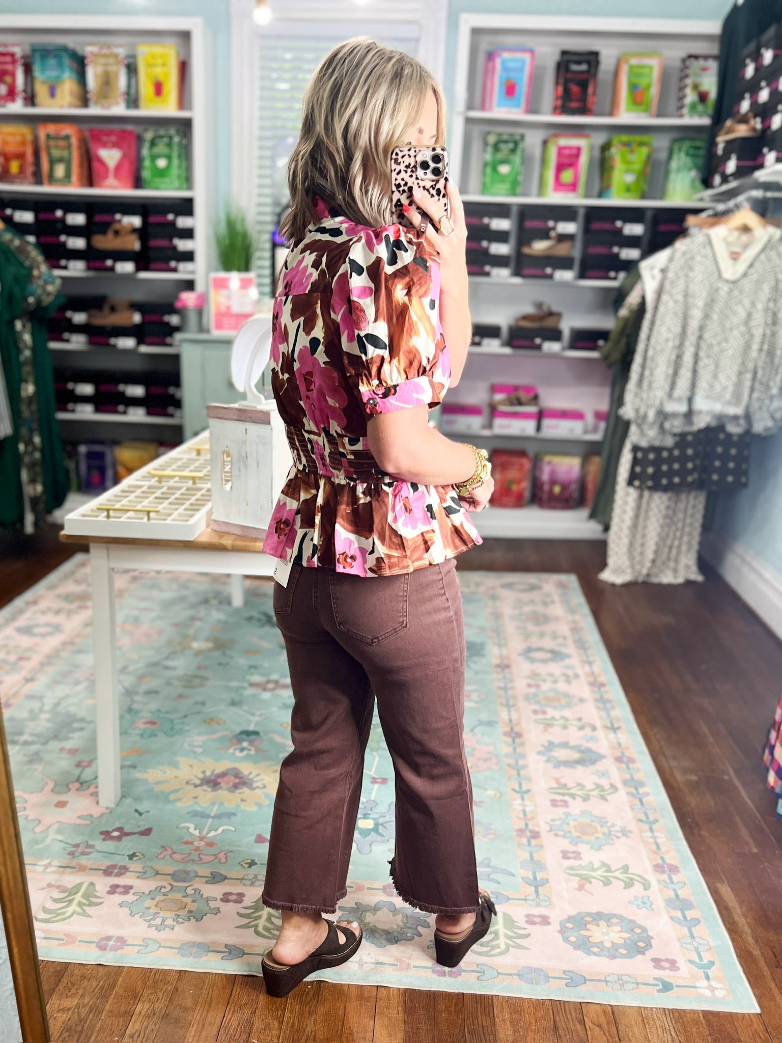 Floral print peplum top with gathered waist bow and short sleeves, brown and pink