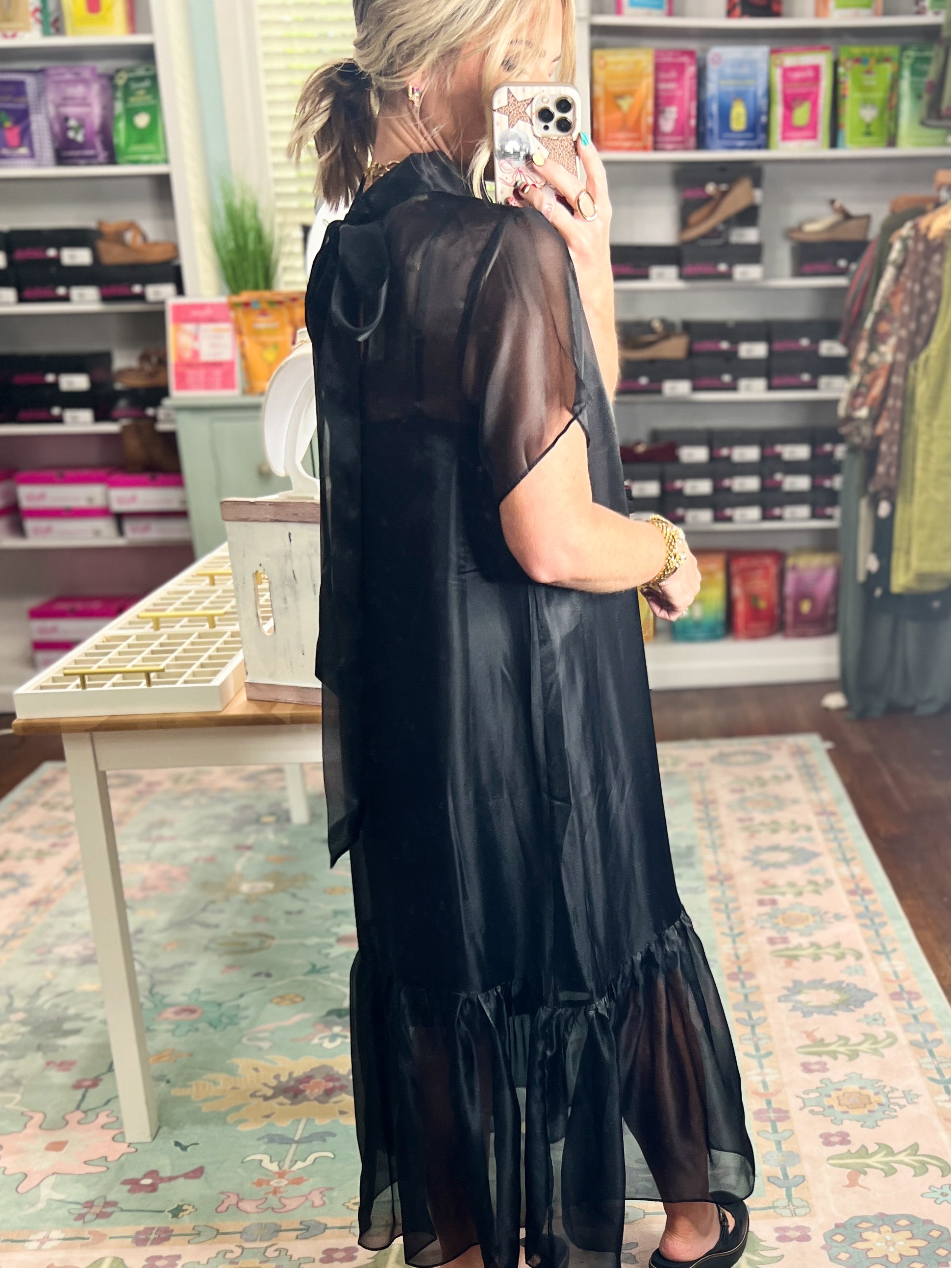 Black chiffon midi dress with short sleeves and tiered ruffle hem