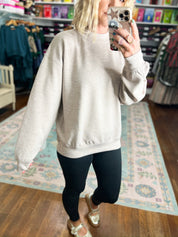 Taupe mock neck modal pullover sweater with relaxed fit, side view