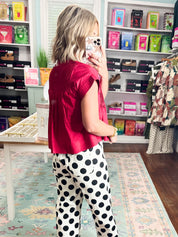 Crimson poplin top with short sleeves, button-front, and gathered yoke