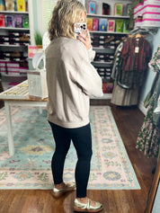 Taupe mock neck modal pullover sweater with long sleeves, worn in back view