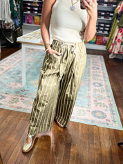 Wide pocket striped pants in olive green and white stripes, wide legs, elastic waist