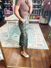 Camo relaxed-fit pants with elastic waist and wide legs, green and dark pattern