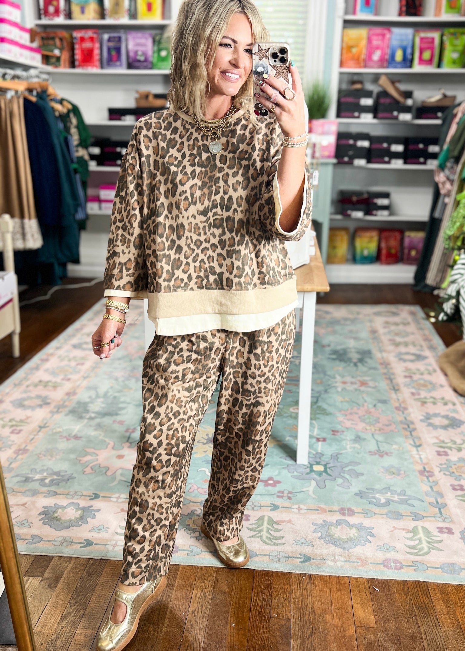 Animal-print top with a relaxed cut, three-quarter sleeves, and contrasting ecru hem