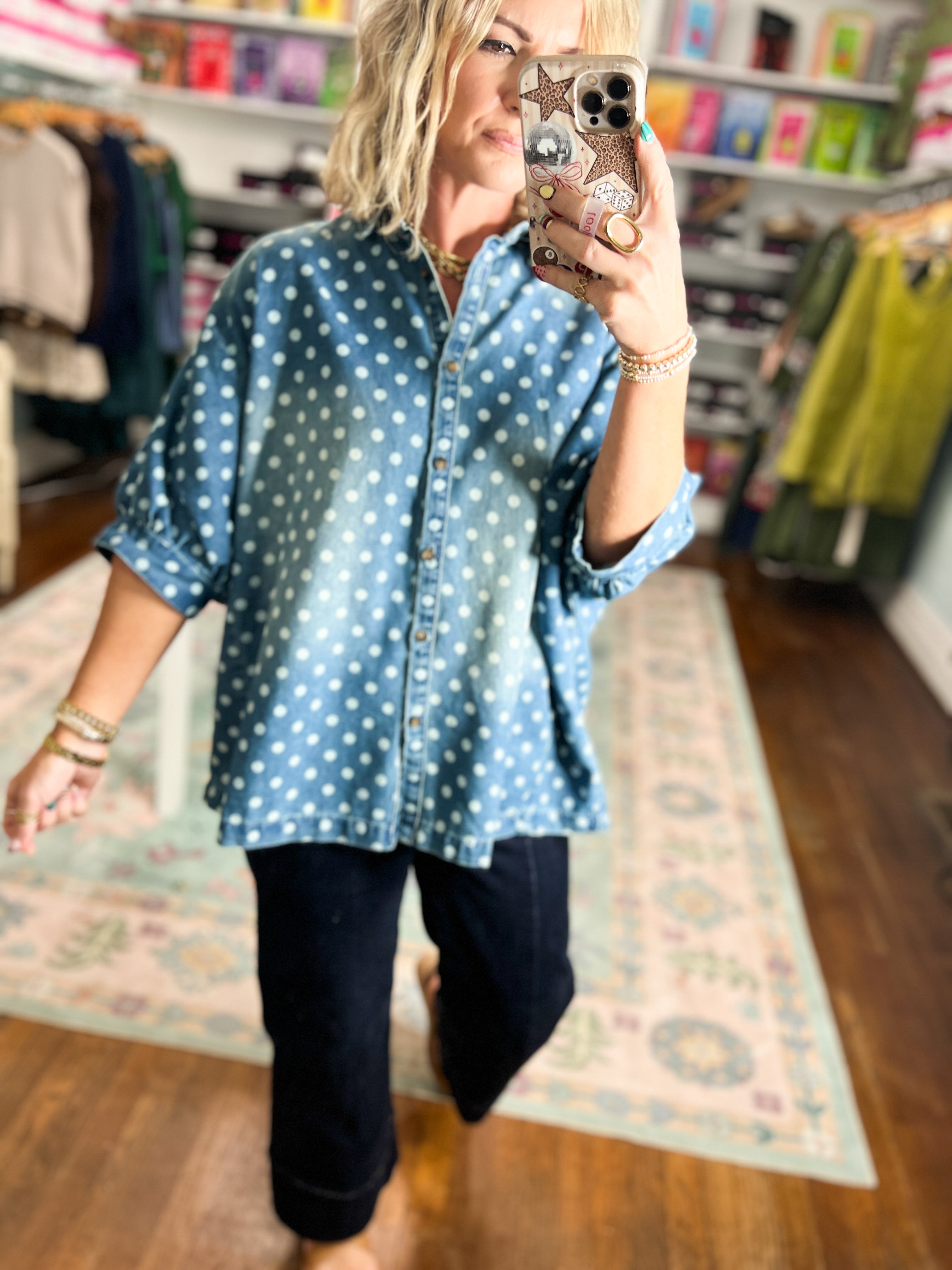 Light blue denim button-front shirt with white polka dots, short sleeves and collar