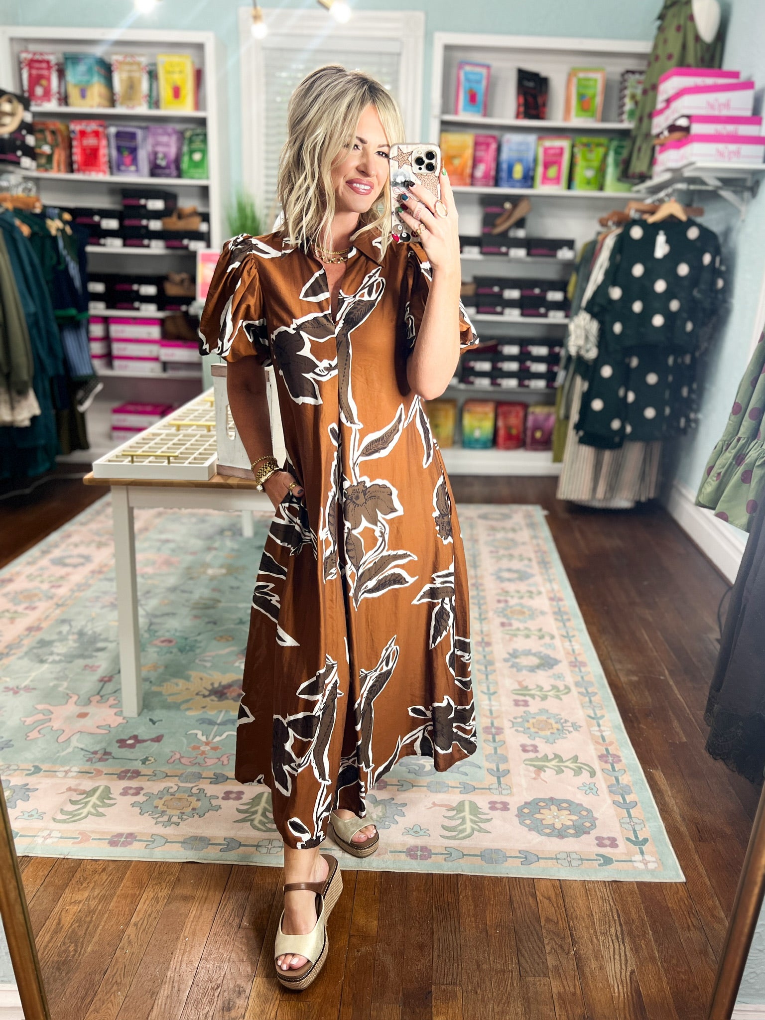 Rust-brown patterned puff sleeve dress, scooped neckline and black/white floral design