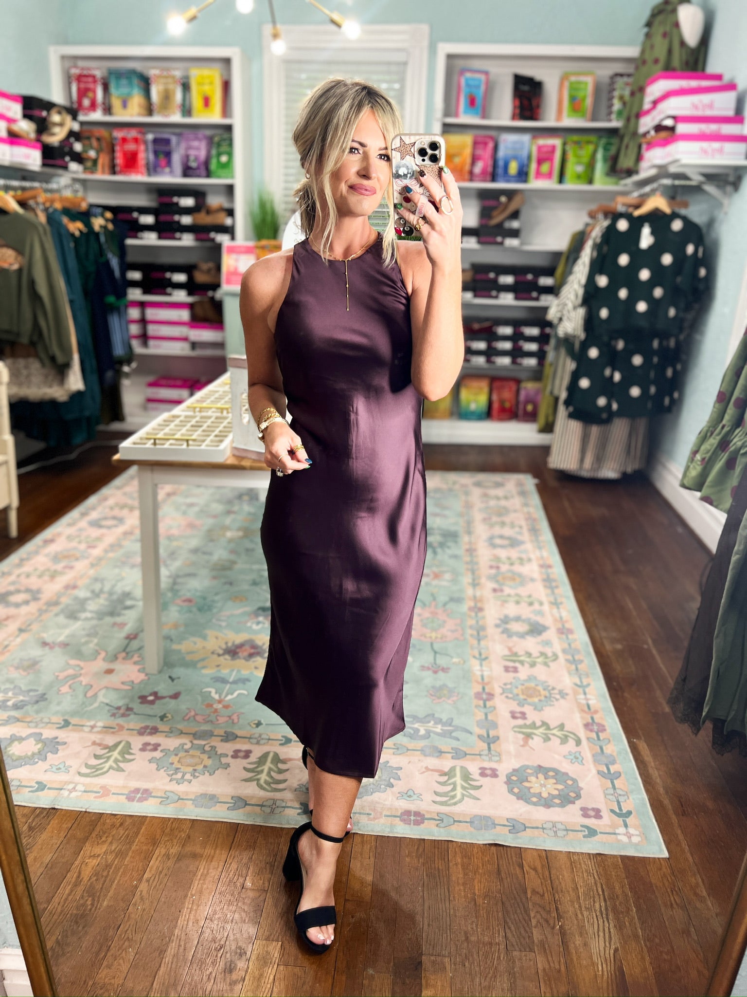 Dark cherry satin midi dress, sleeveless round neck with draped fitted mid-calf length.