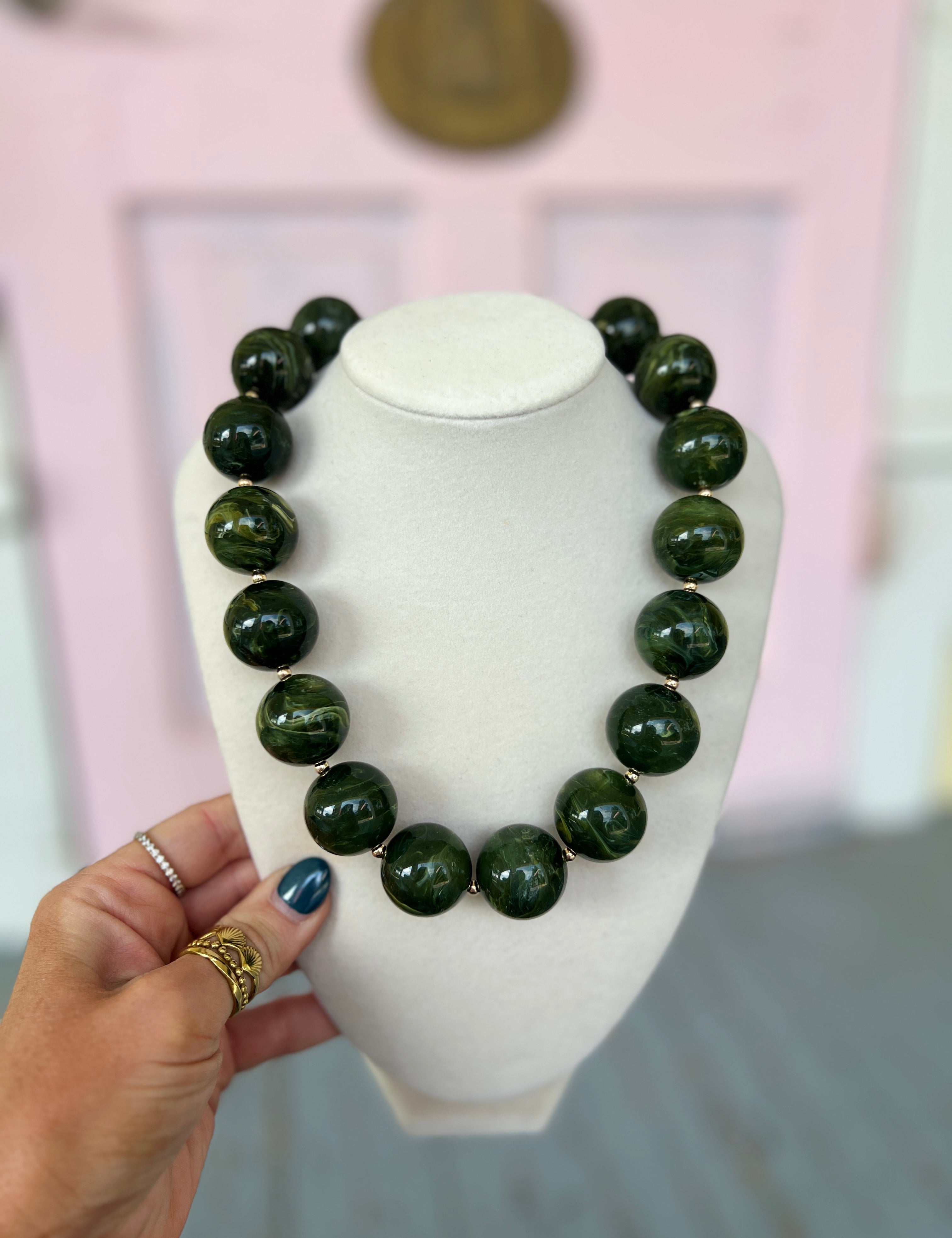 Olive marble acrylic bead necklace with round dark-green marbled beads