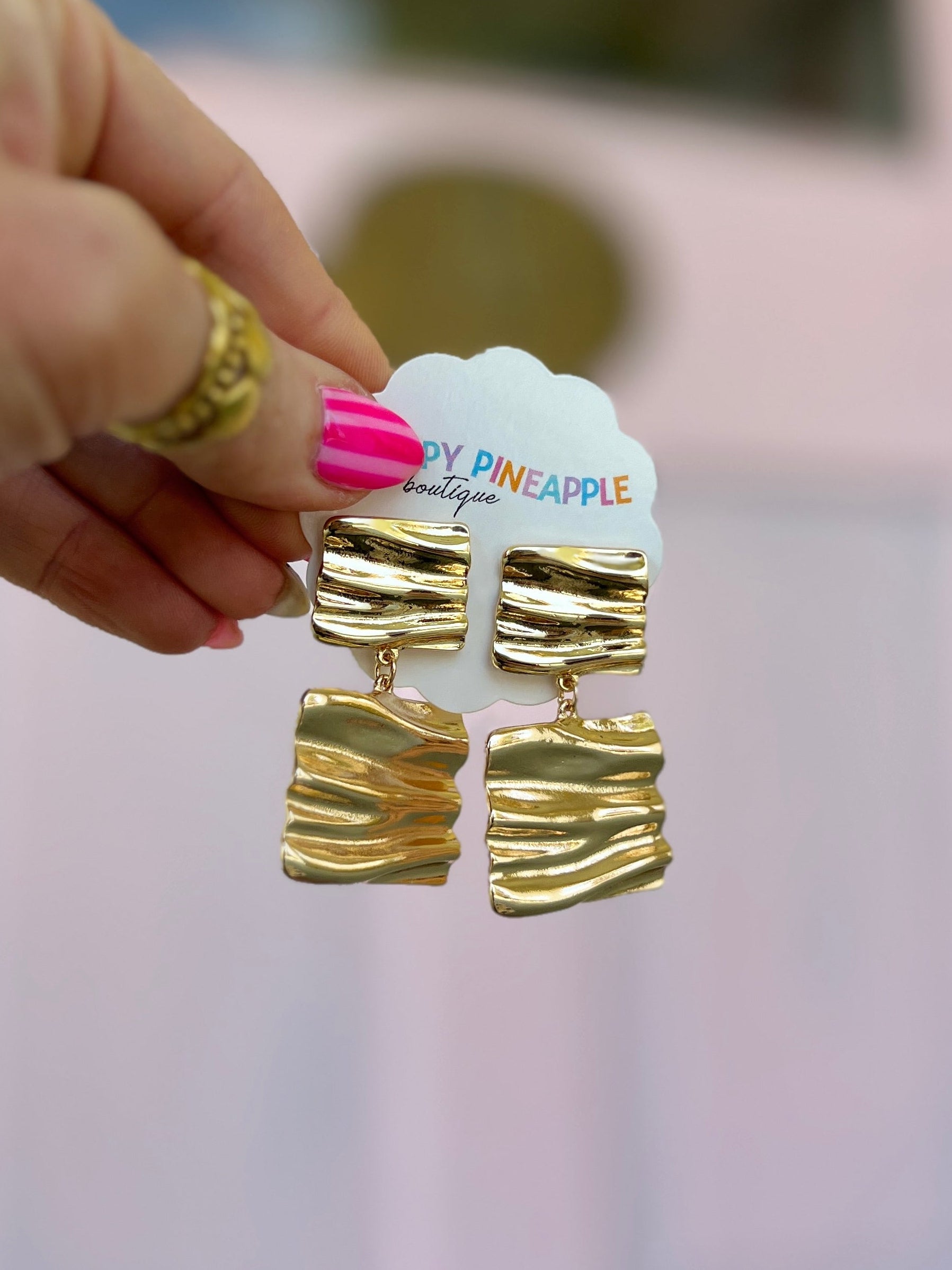 Gold-tone square linked earrings with bumpy texture, four-piece design