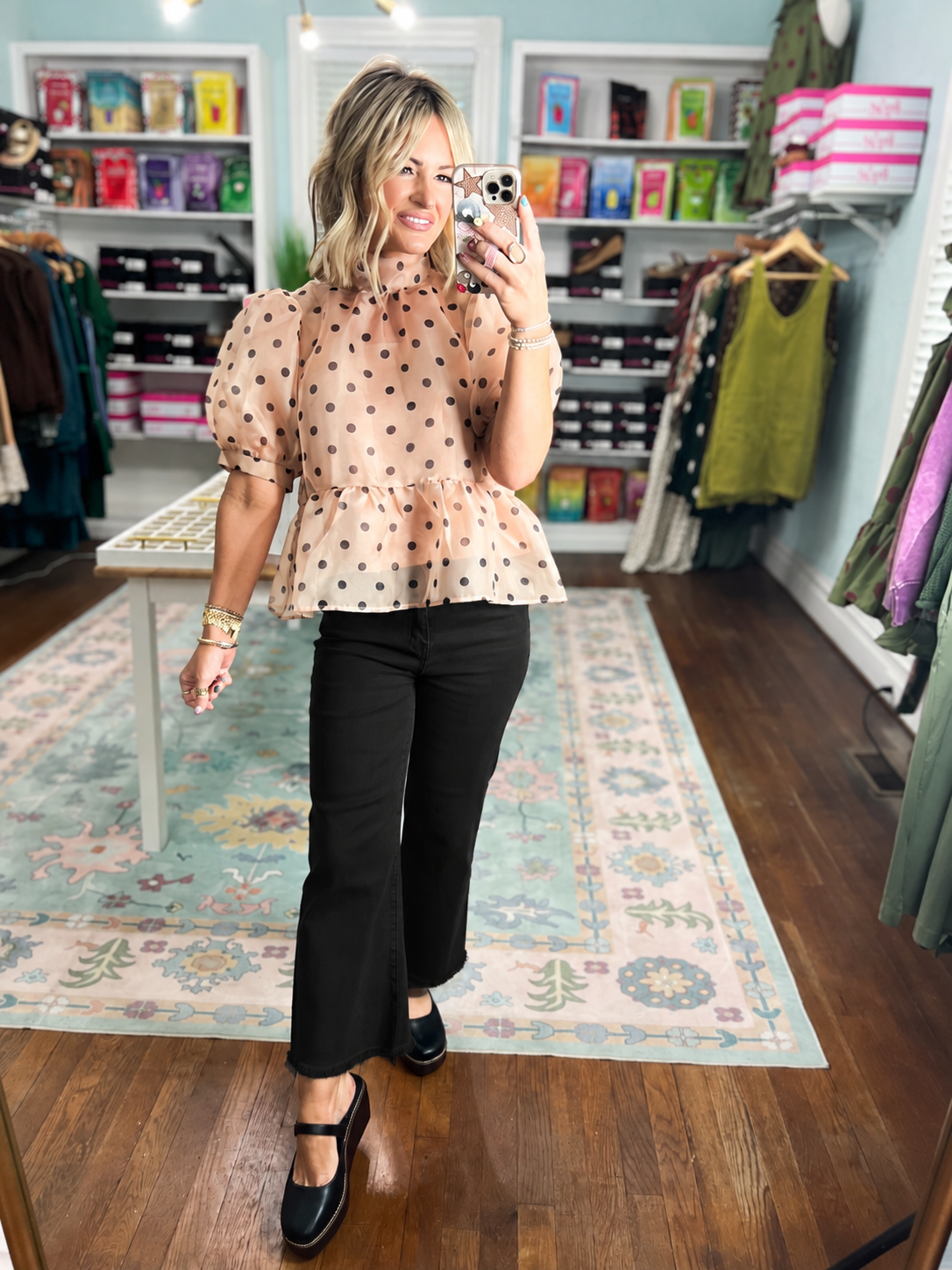 Polka dot peplum top with puff sleeves, light pink fabric and dark scattered dots