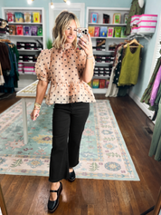 Polka dot peplum top with puff sleeves, light pink fabric and dark scattered dots