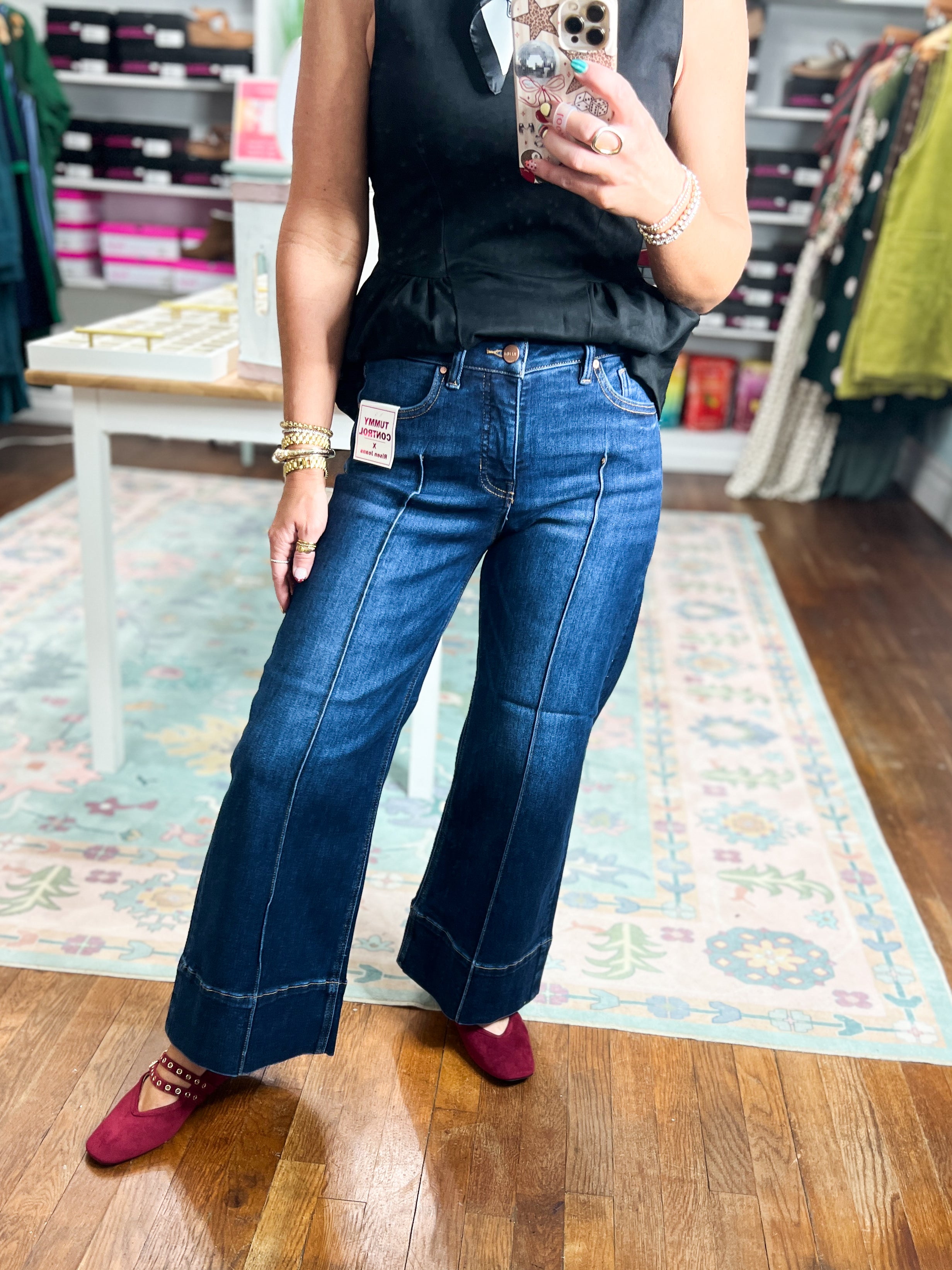 Deep blue mid-rise crop wide-leg jeans with pintuck front and belt loops