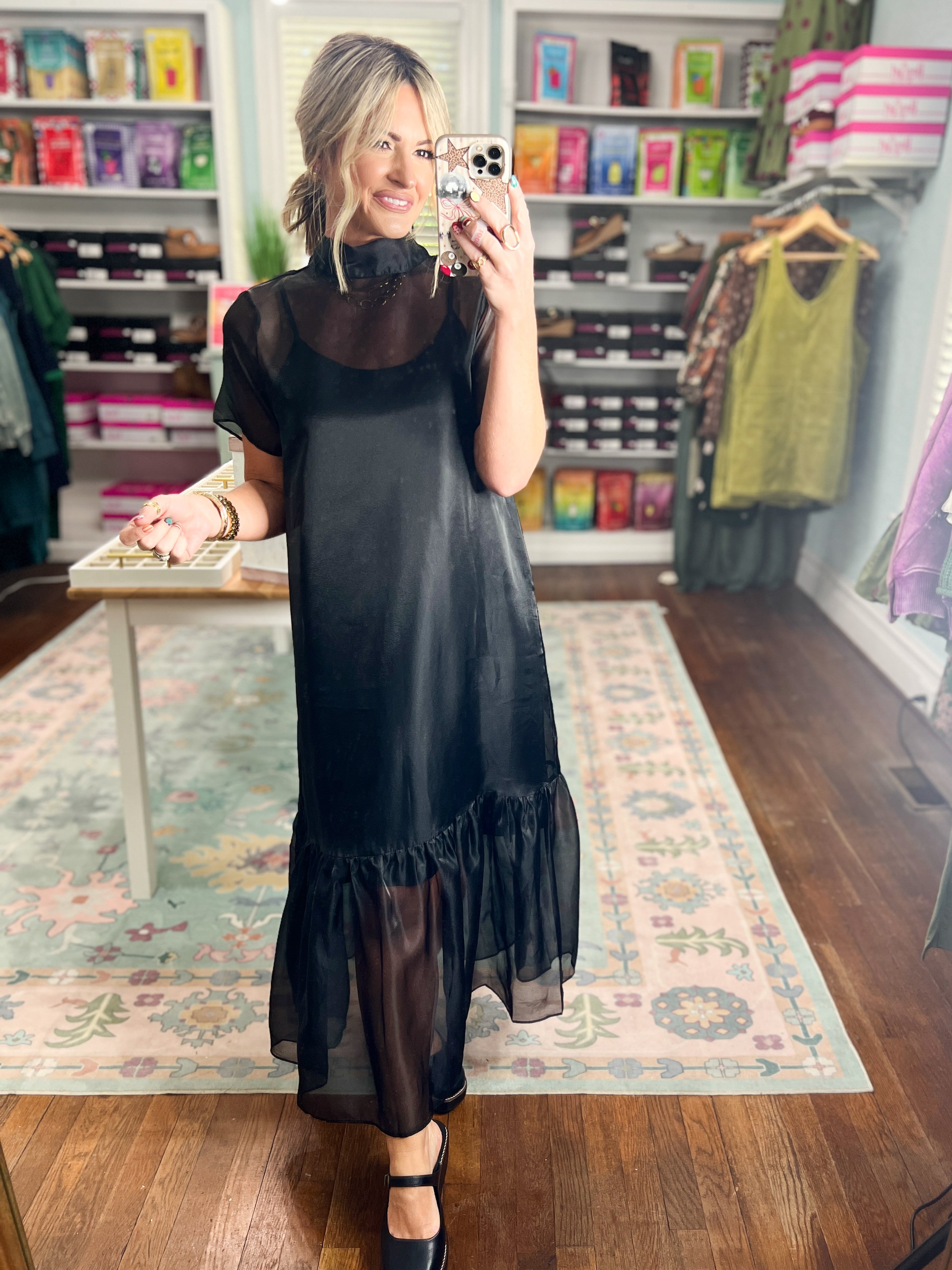 Black chiffon midi dress with short sleeves and layered ruffle skirt