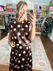 Brown polka-dot bubble top with short sleeves and gathered skirted hem