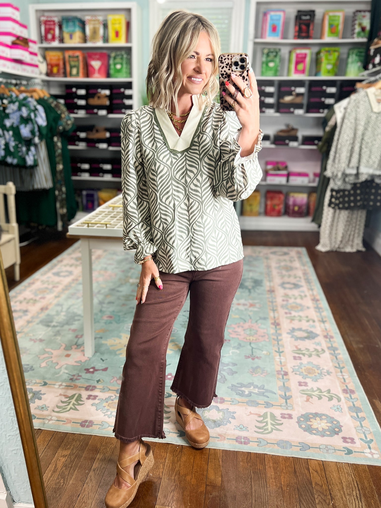 Women's sage botanical puff blouse, cream leaf pattern, V-neck and gathered cuffs