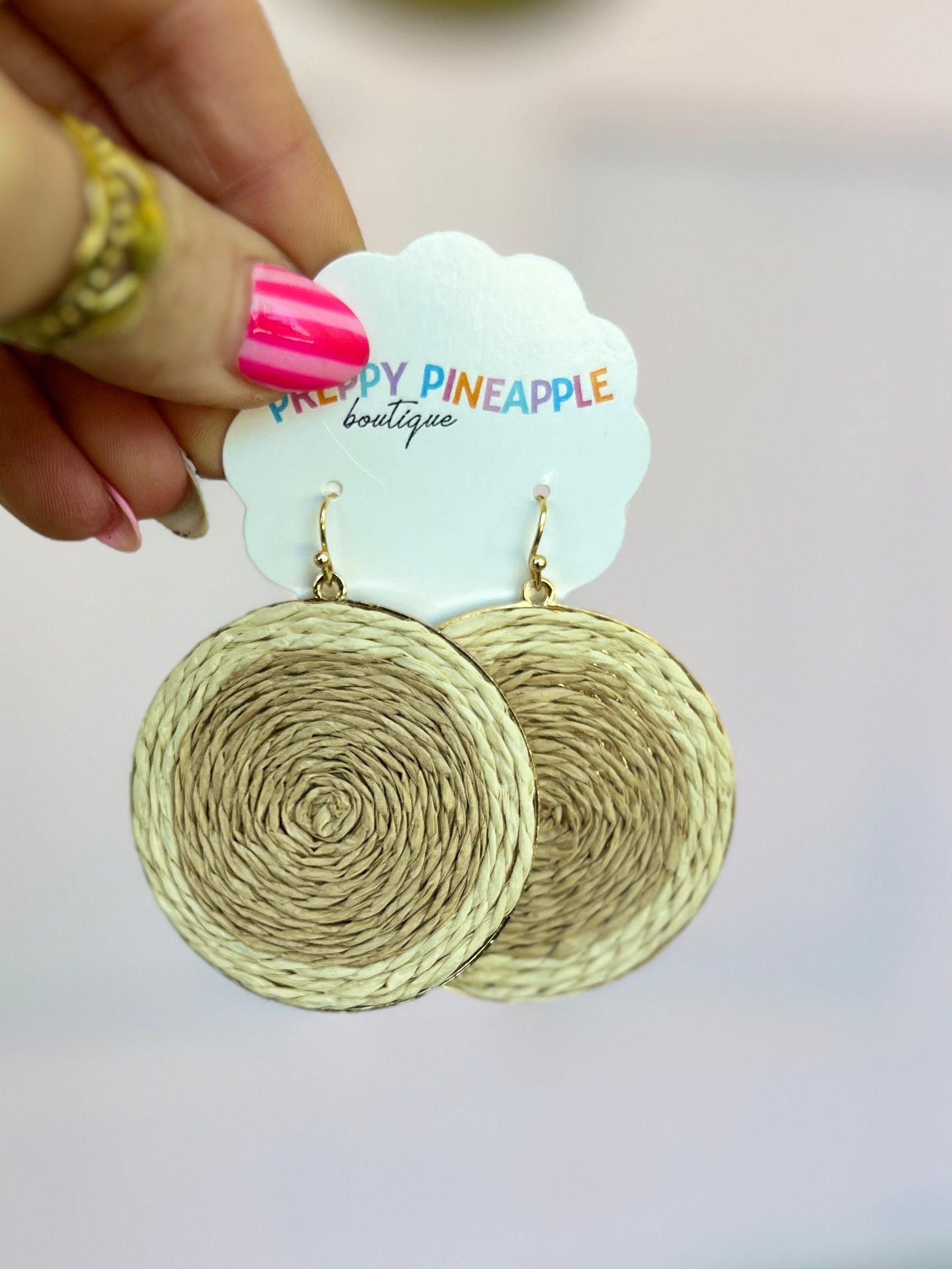 Color-blocked raffia round earrings, two woven light-green circles with gold hooks