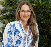 Eyeglasses on model: light gray frames with patterned temple arms