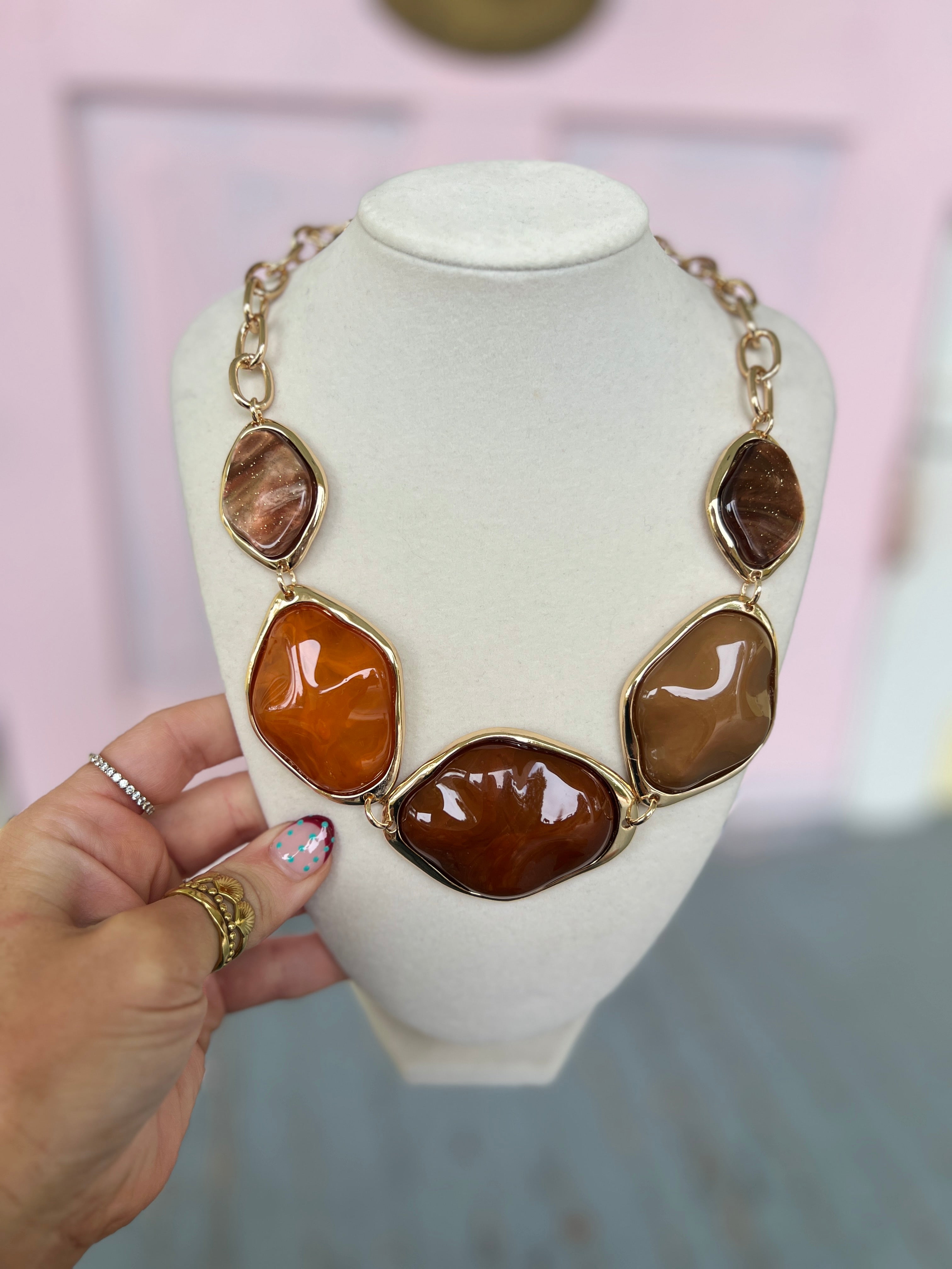 Geometric acrylic necklace set with tortoise-toned cabochon links and gold chain