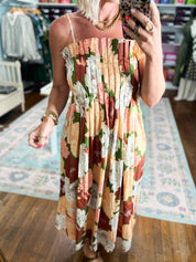 Floral midi dress close-up, gathered square bodice with sleeveless wide shoulder straps