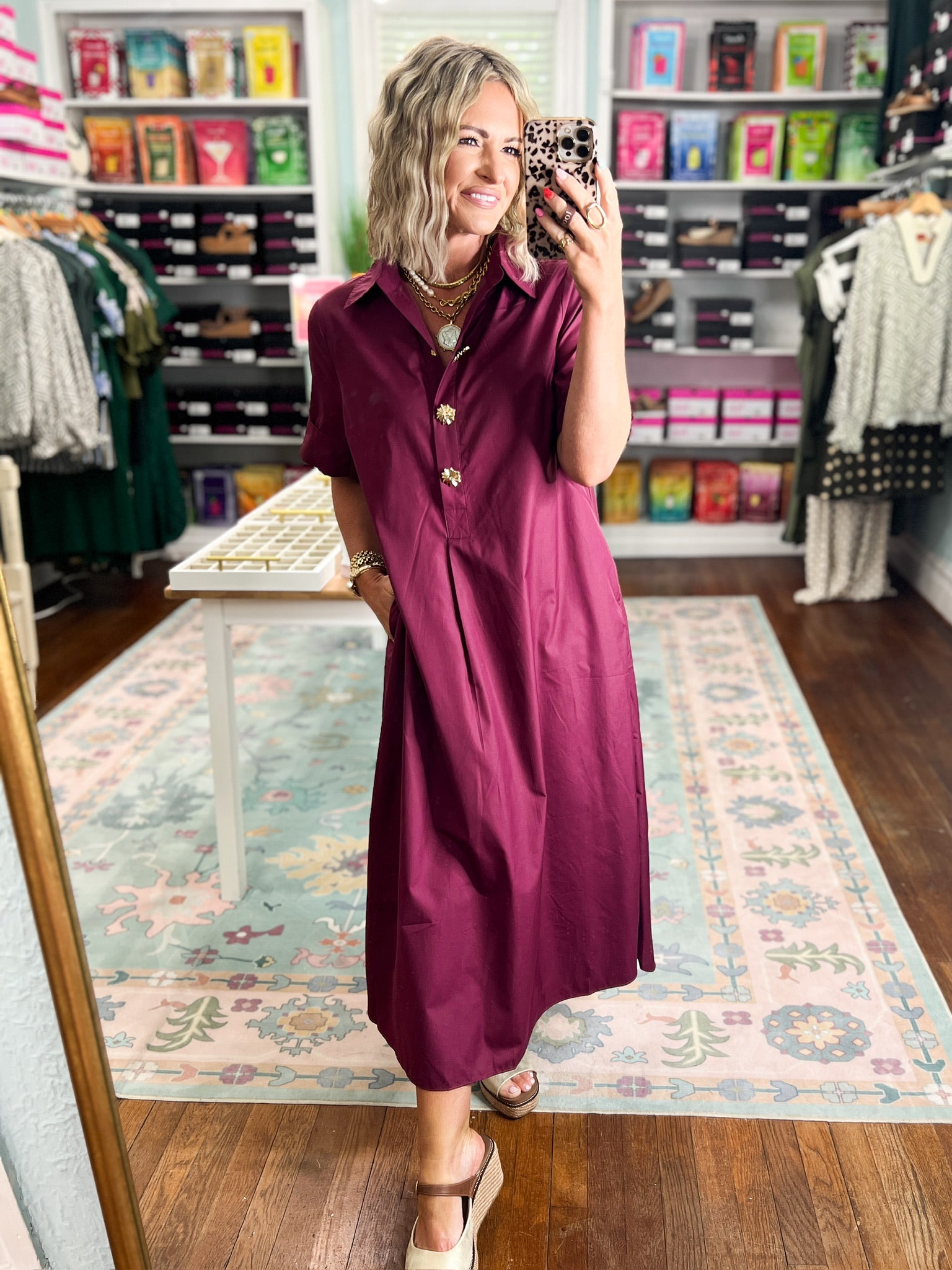 Wine midi dress with short sleeves and small button detail at the neckline
