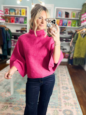 Fuchsia mock neck knit sweater with ribbed turtleneck and bracelet-length sleeves