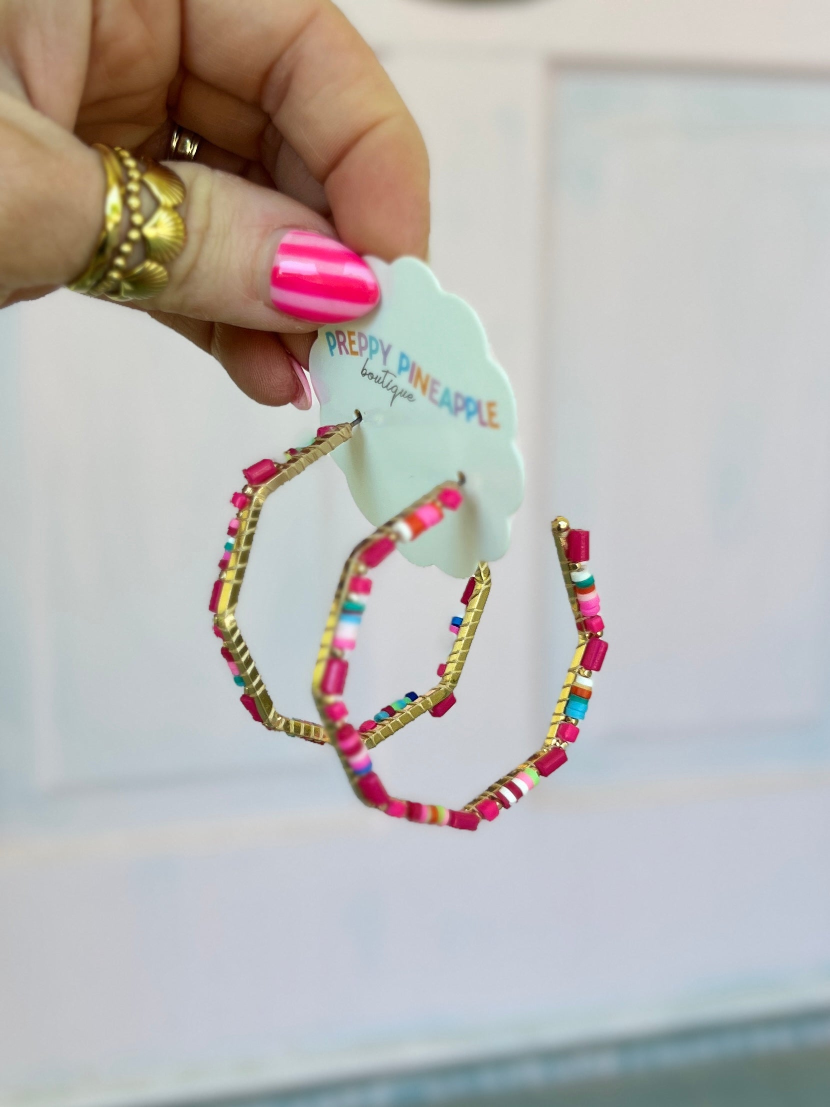 Beaded octagon hoop earring with pink and multicolor bead rows