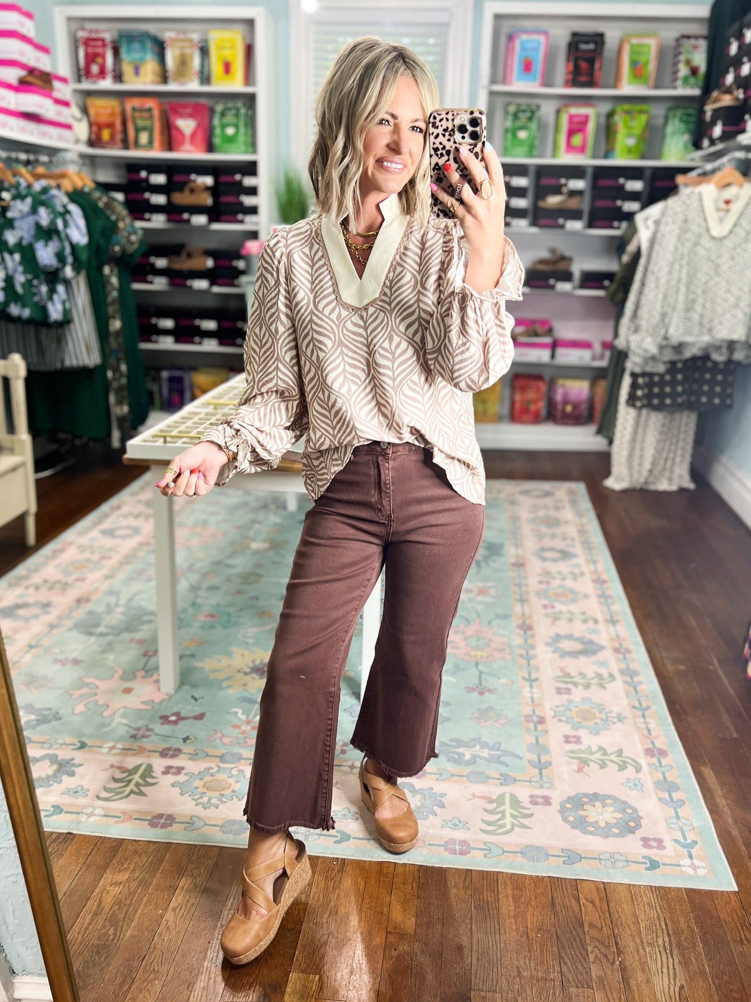 Beige botanical puff-sleeve blouse with V neckline and tan leaf pattern