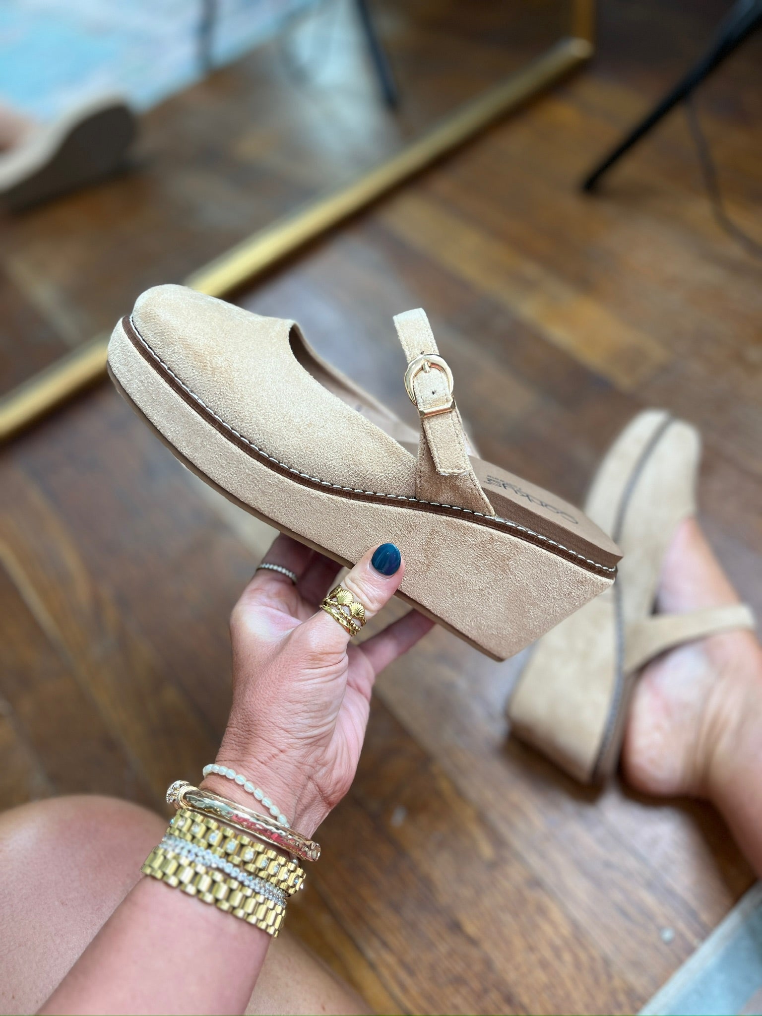 Camel faux suede mule with adjustable buckle strap and flat sole