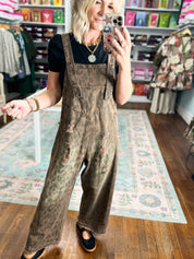 Feline Fine animal-print denim overalls with adjustable straps, front bib pocket