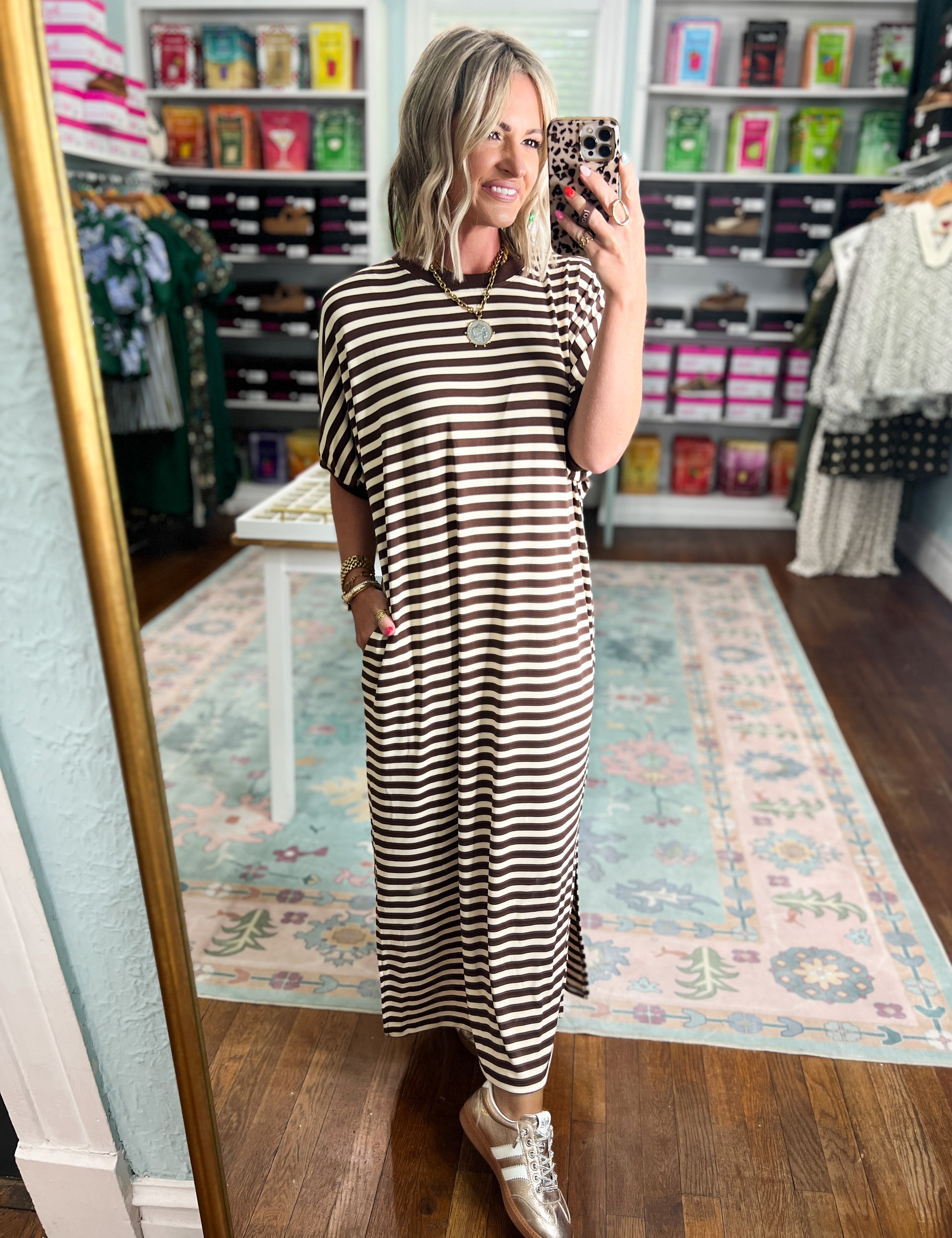 Brown and cream striped midi dress with short sleeves and long vertical stripes