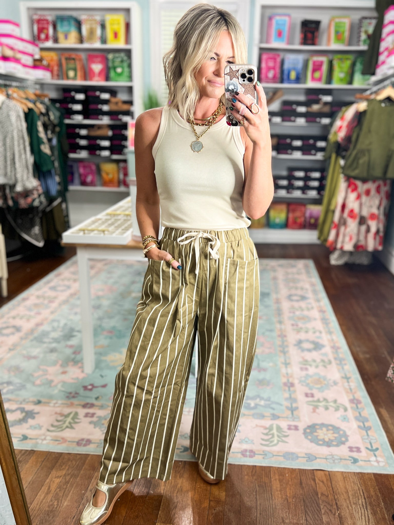 Wide pocket striped pants in olive green and white stripes, wide legs, tie waist