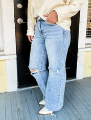 Risen High Rise Distressed Wide Leg Jeans