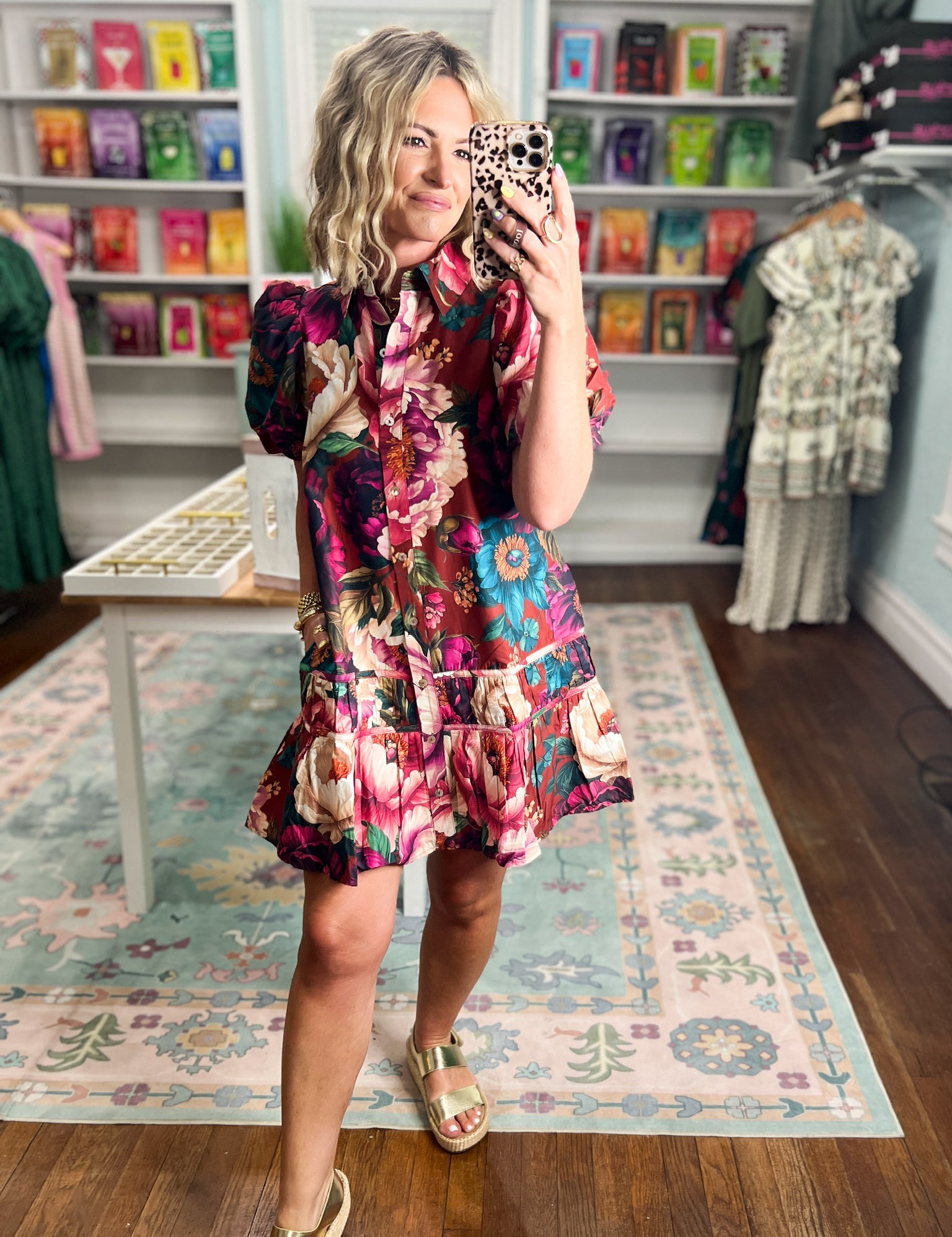 Floral print puff-sleeve mini dress with ruffled tiers and waist tie belt