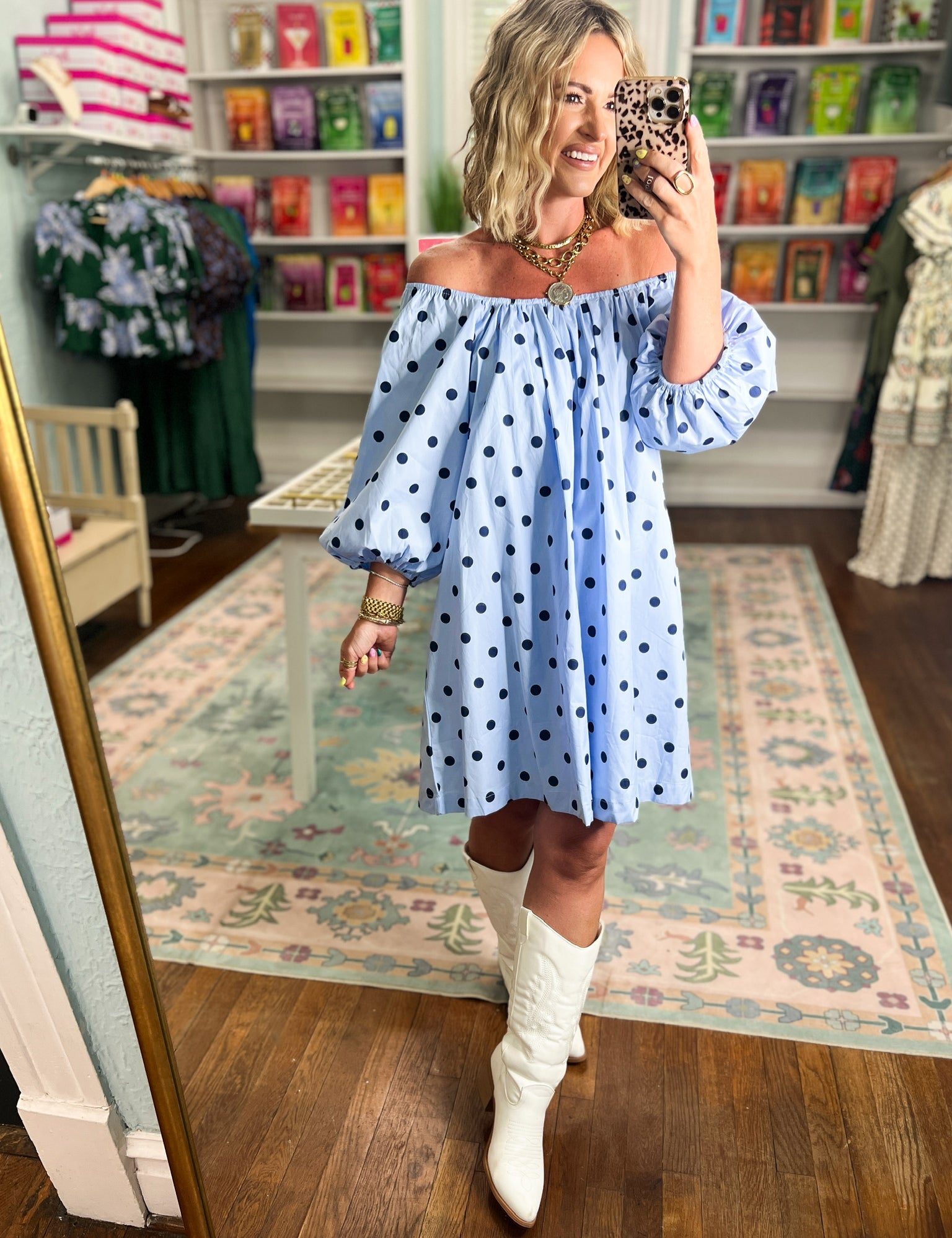 Sky blue mini dress with navy polka dots, gathered neckline and flared skirt