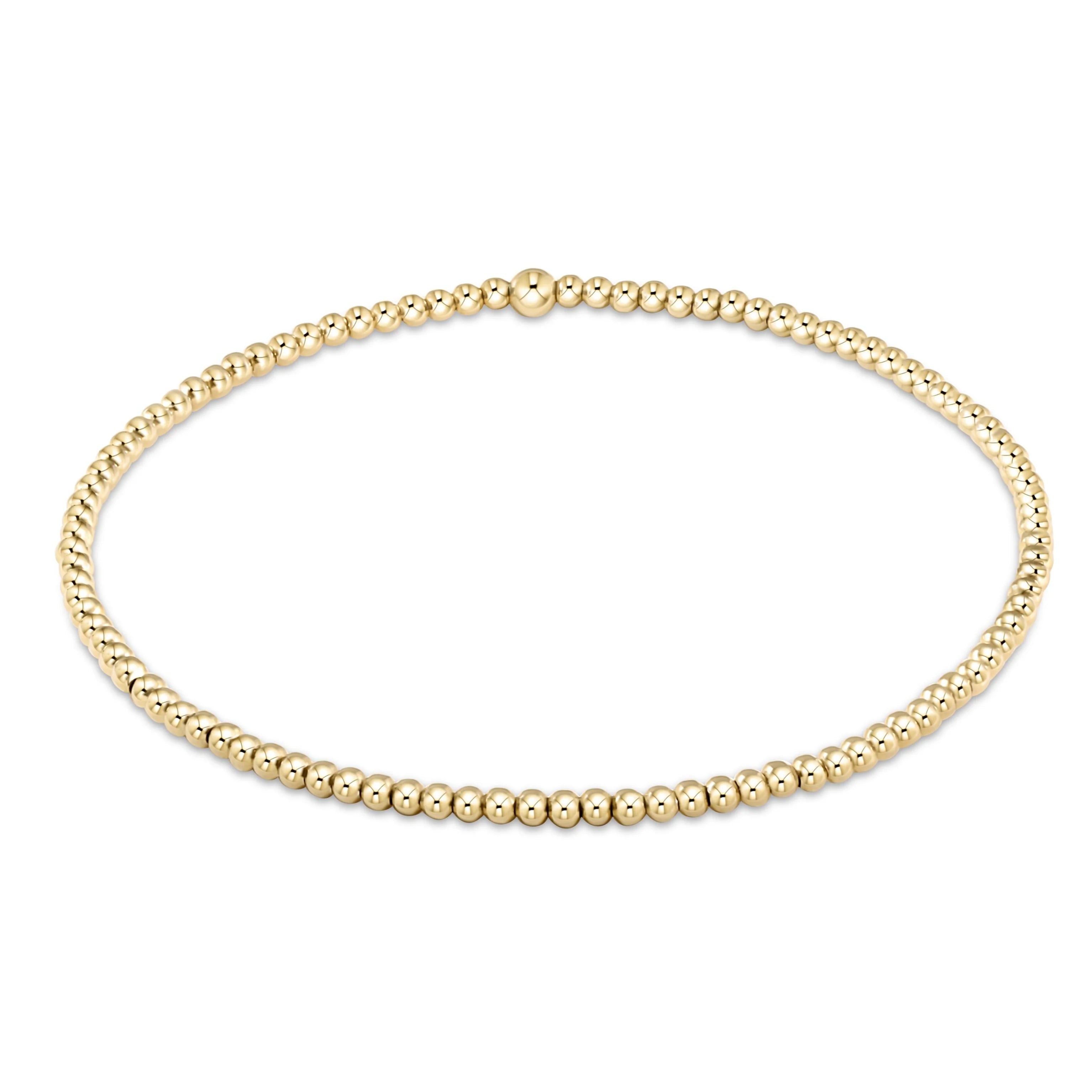 Gold beaded bracelet with small round clasp