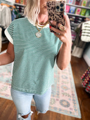 Hunter green and white striped short-sleeve crew-neck top, neckline close-up