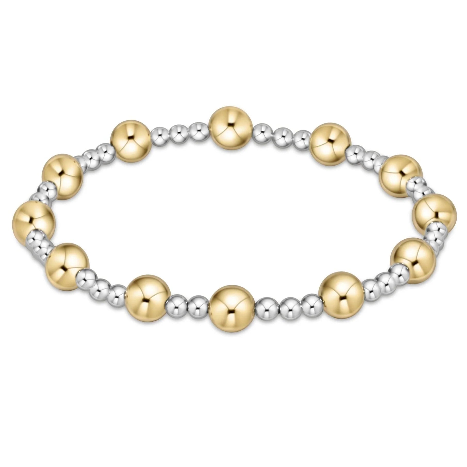 Mixed metal beaded bracelet with alternating gold and silver round discs
