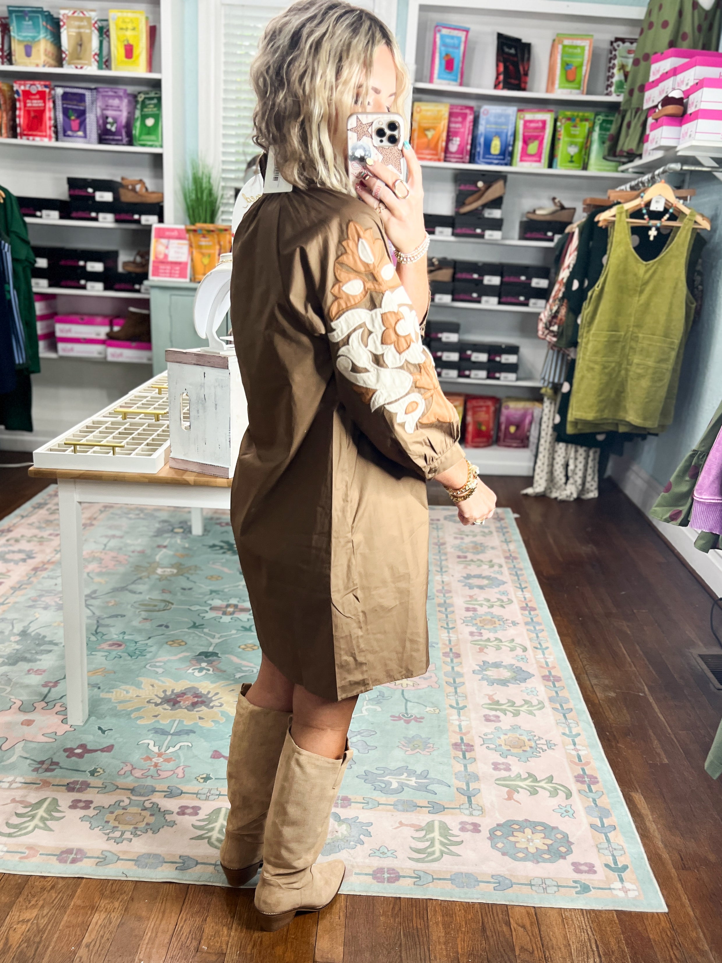Brown long-sleeve mini dress with baroque floral motif and relaxed A-line cut