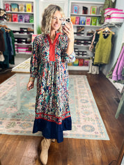 Floral tiered maxi dress with long sleeves and navy tiered hem