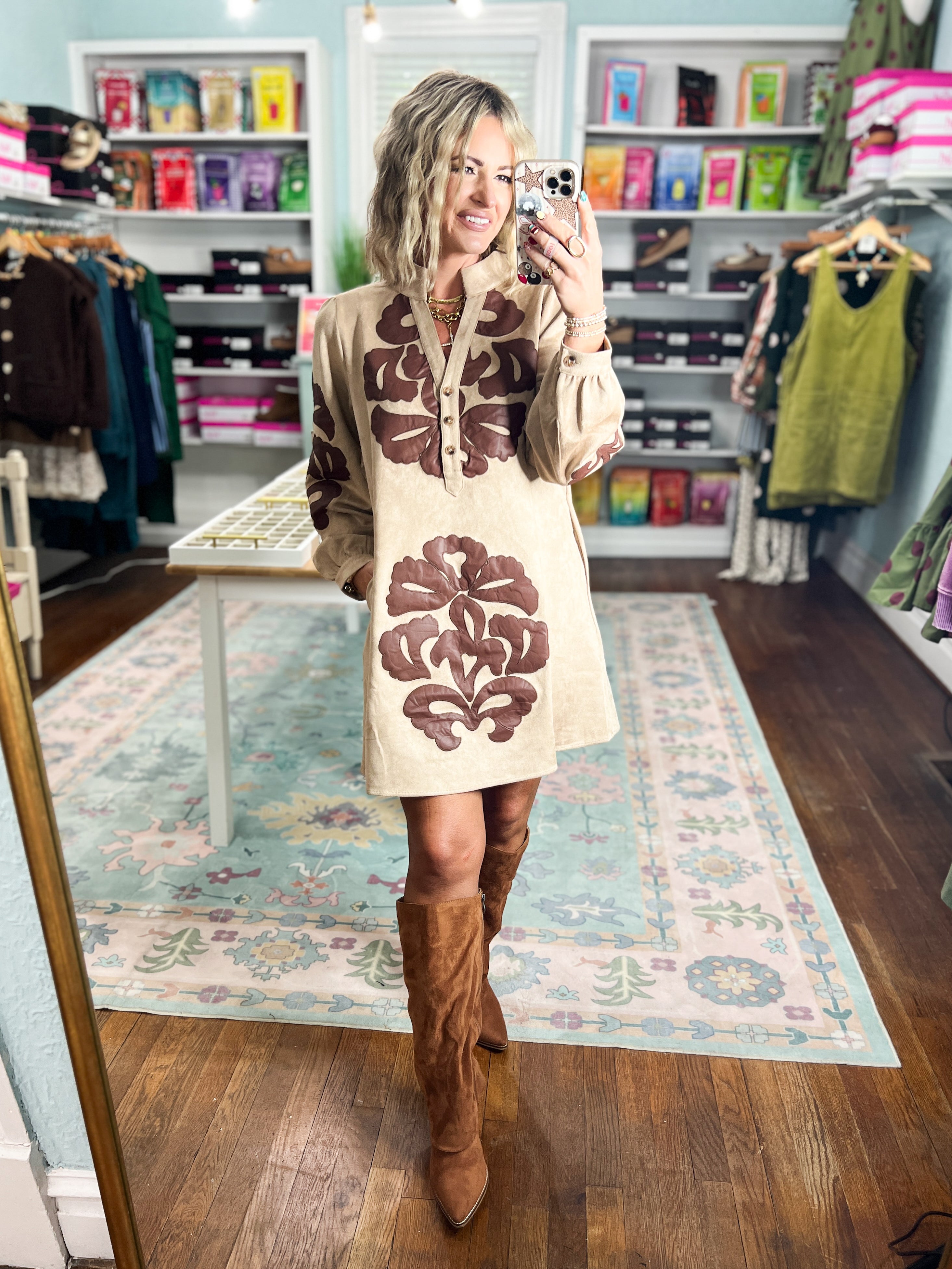 Taupe applique dress with long sleeves, floral front design, and buttoned neckline
