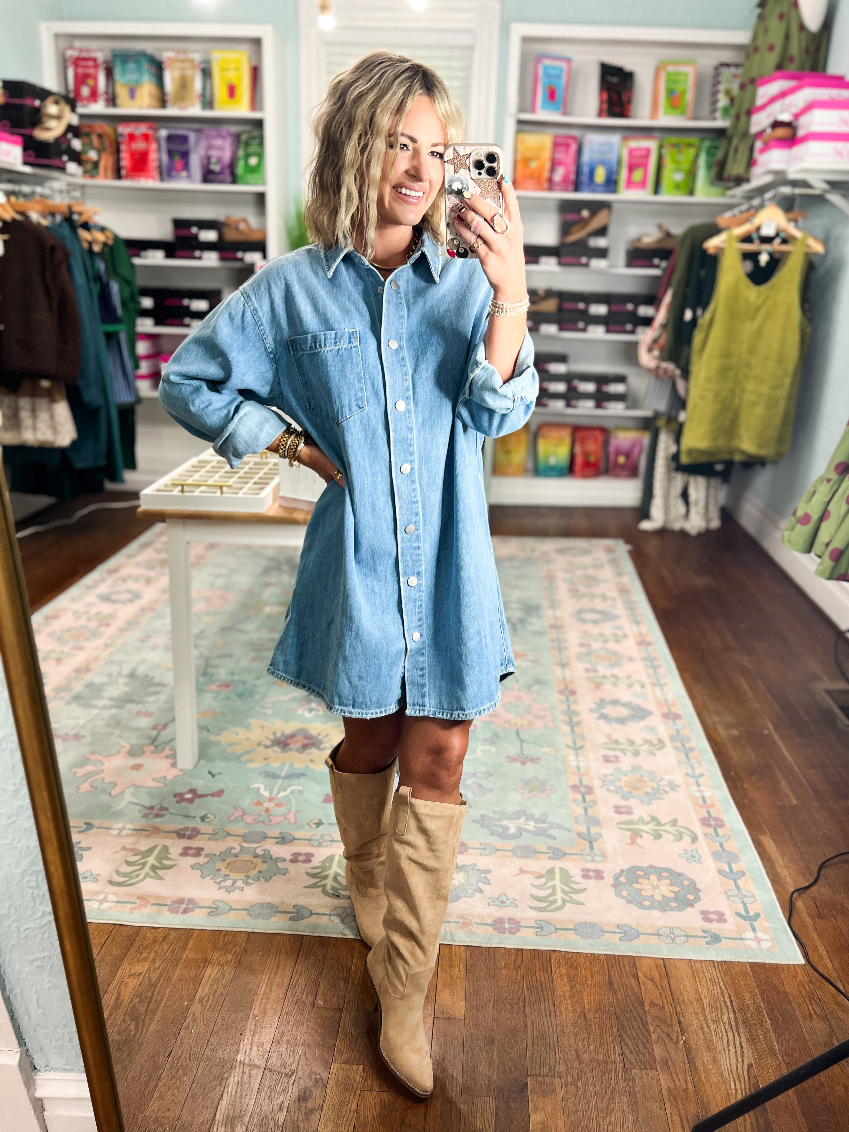 Oversized medium-wash denim shirt dress, long sleeves, button front, chest pockets