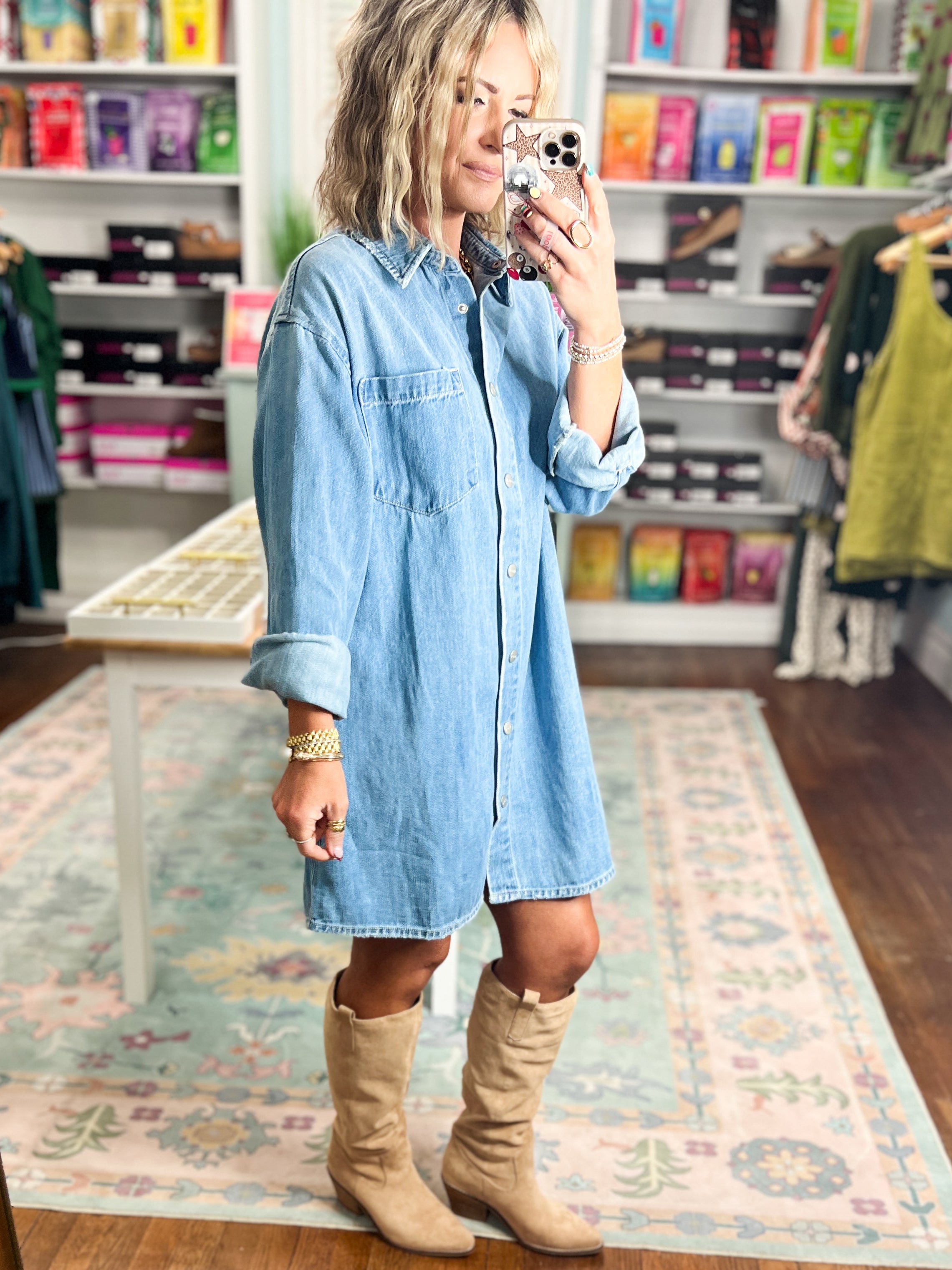 Oversized denim shirt dress with button front, pointed collar, chest pocket detail