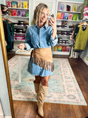Oversized denim shirt dress with fringe waist belt and button front, long sleeves