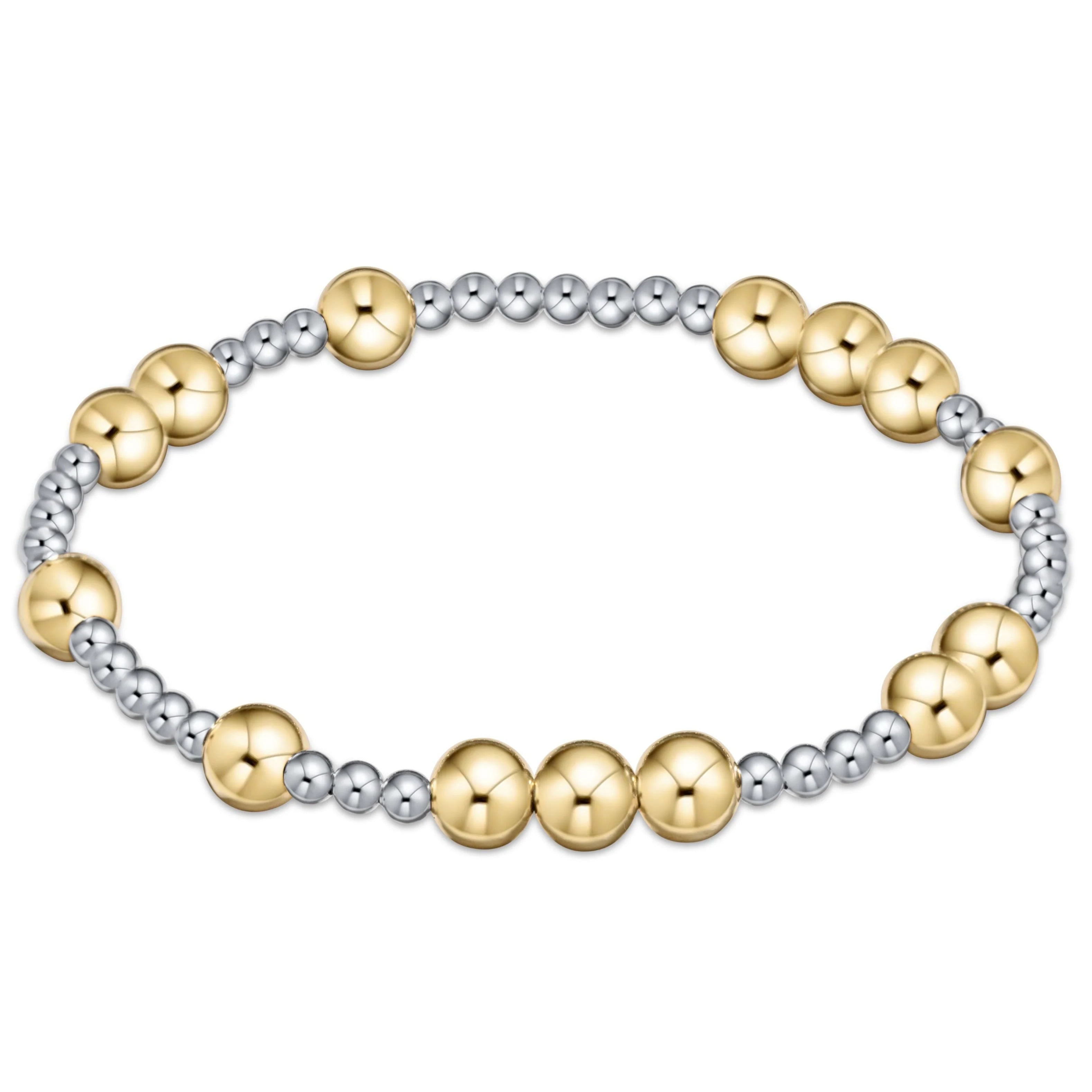 Mixed-metal beaded bracelet with gold-tone and silver-tone round discs and beads