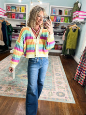 Rainbow striped knit cardigan with button front and V-neck, long sleeves