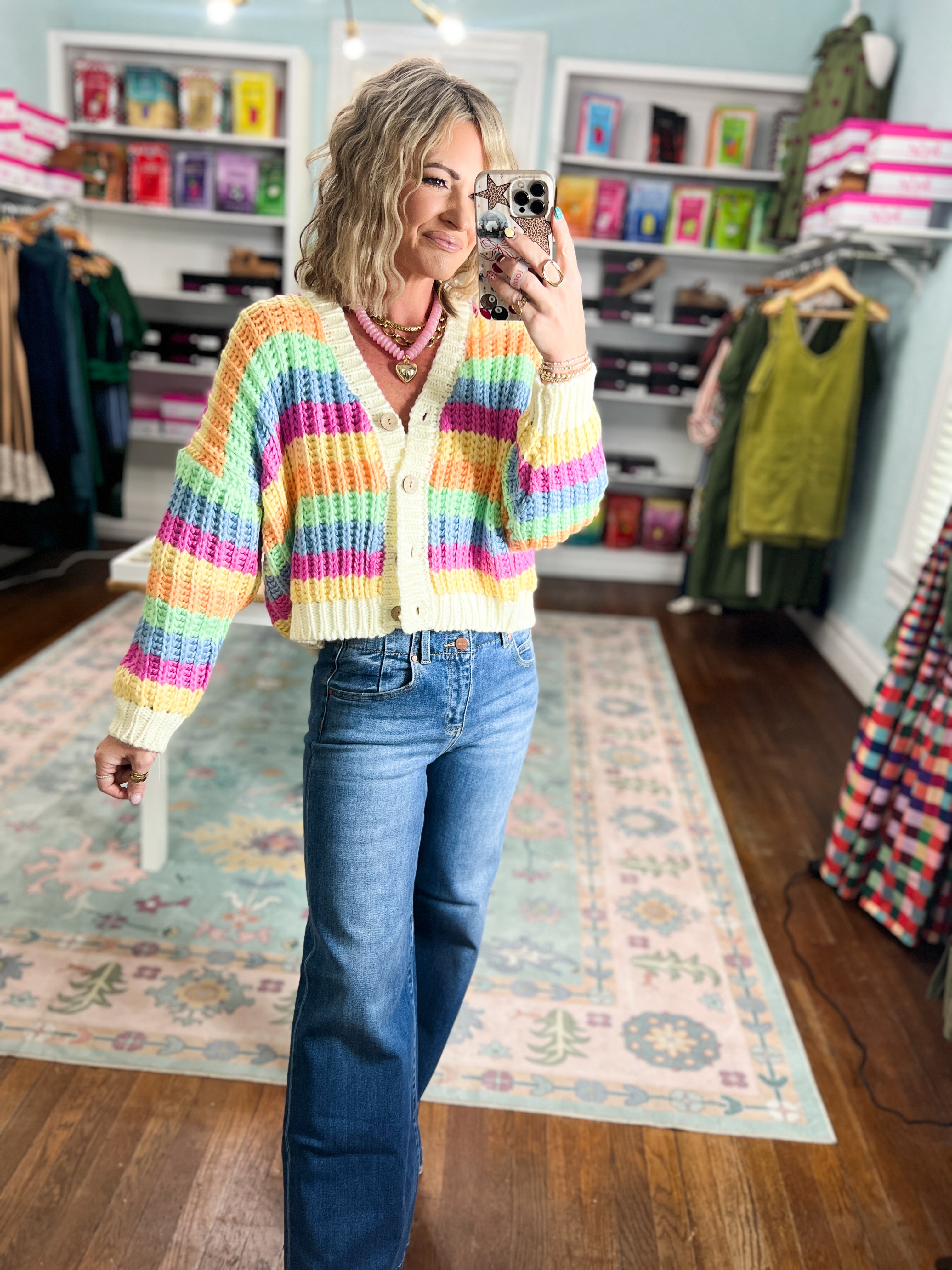 Rainbow striped knit cardigan with button front and V-neck, long sleeves