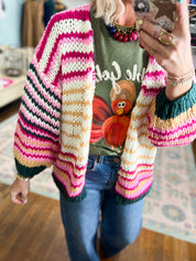 Multicolor striped knit cardigan with long sleeves and ribbed teal cuffs